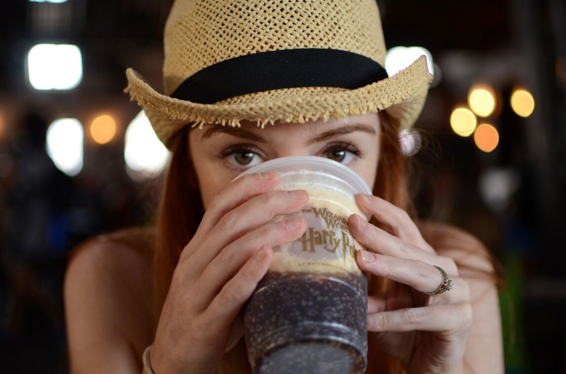 drinking butterbeer at The Wizarding World of Harry Potter at Universal Studios, Florida