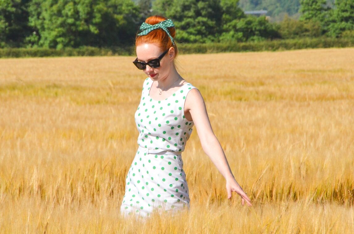 white and green polka dot wiggle dress