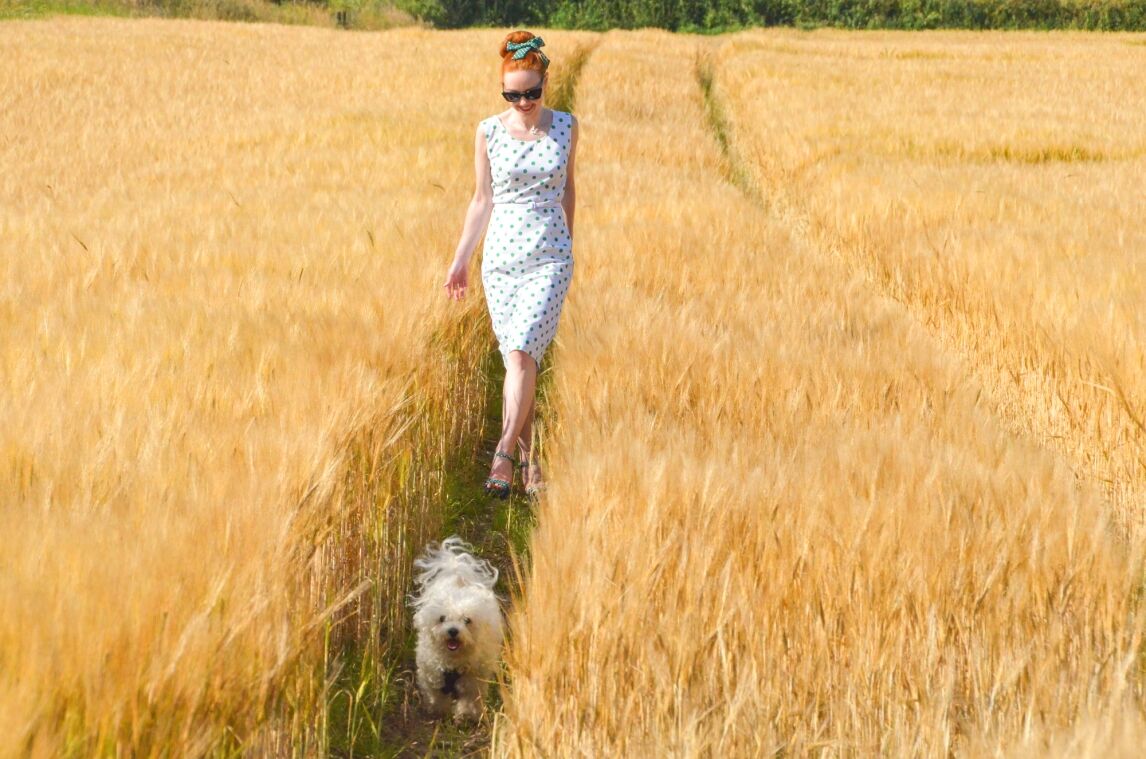 white and green polka dot wiggle dress