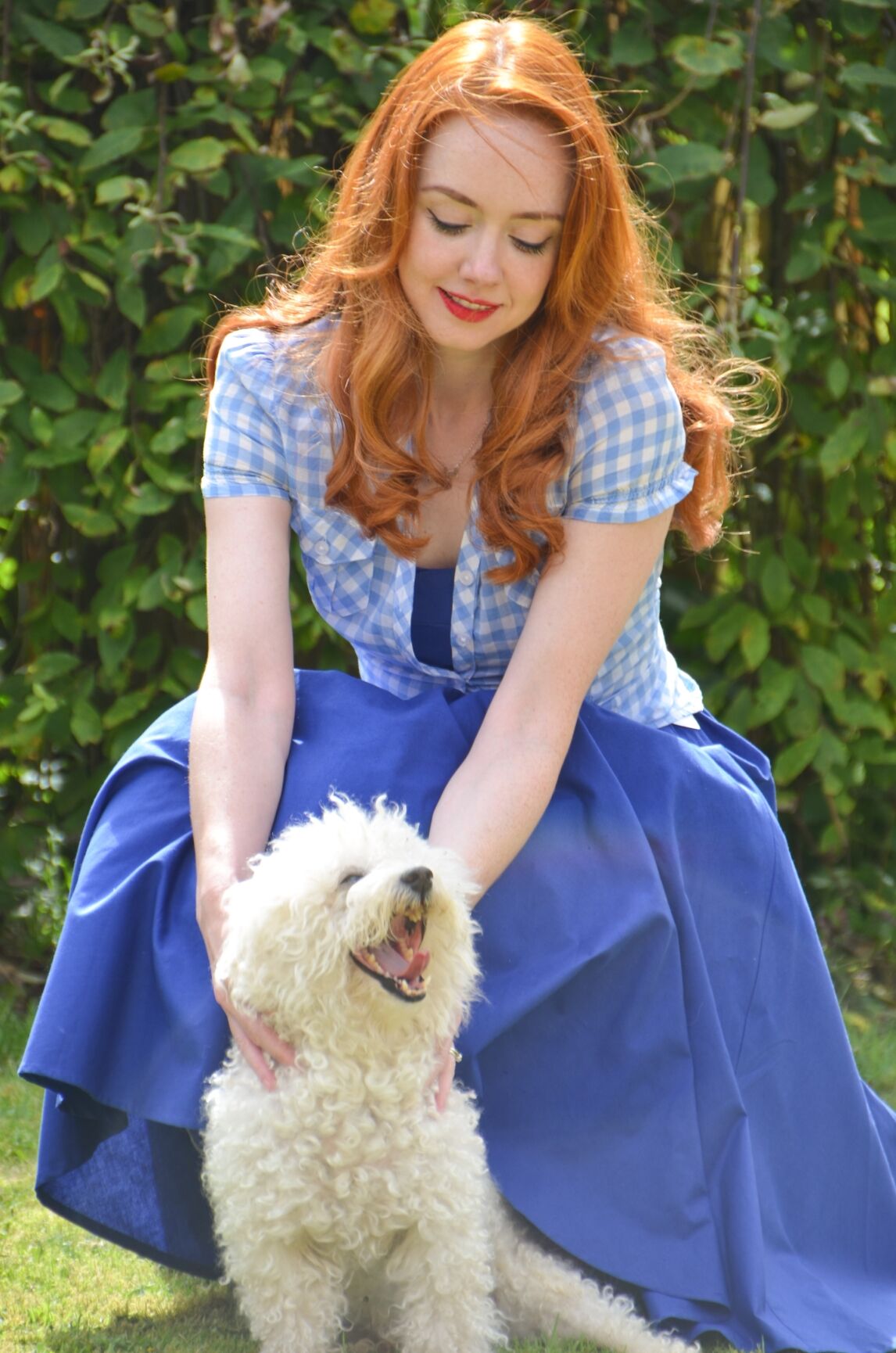 redhead in blue dress