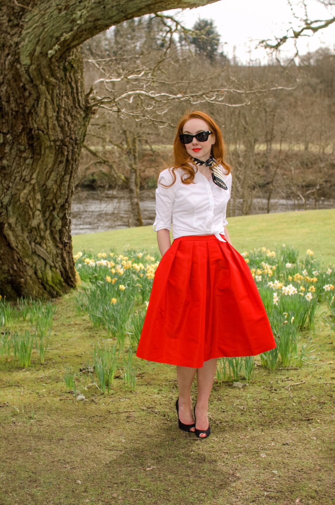 red Tibi skirt with white shirt