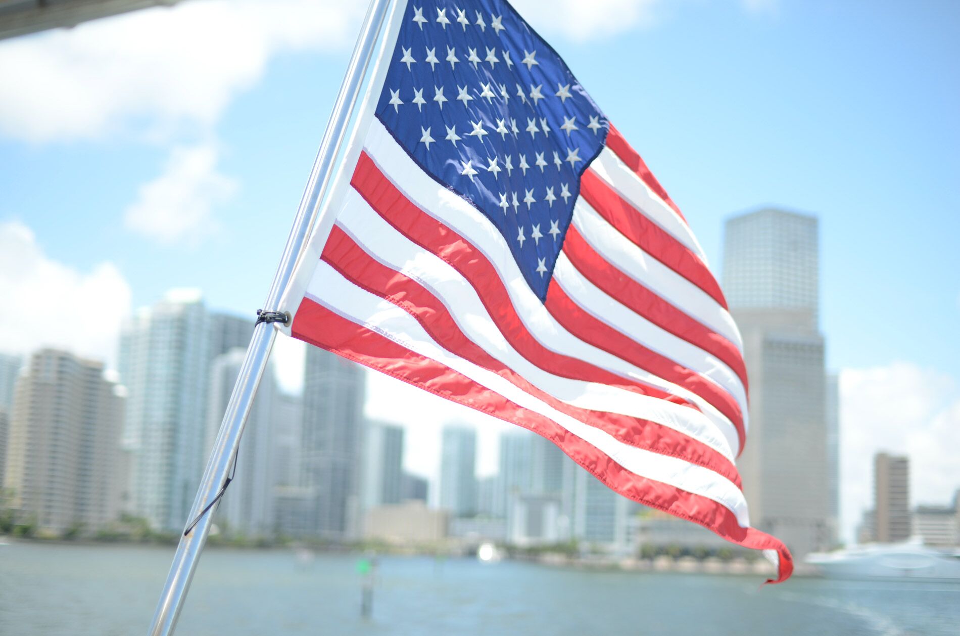 Miami skyline and American flag