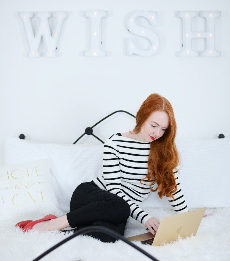 stripe top with black capri pants and red shoes