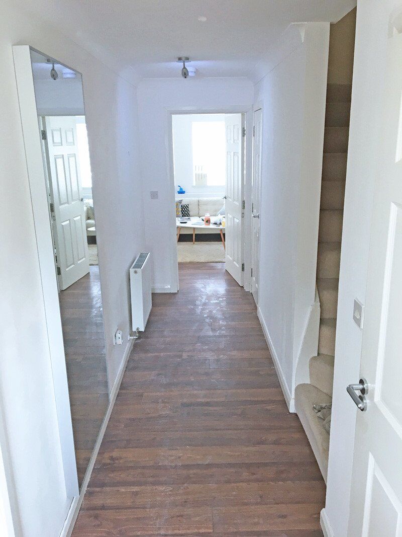 white walls, messy floor