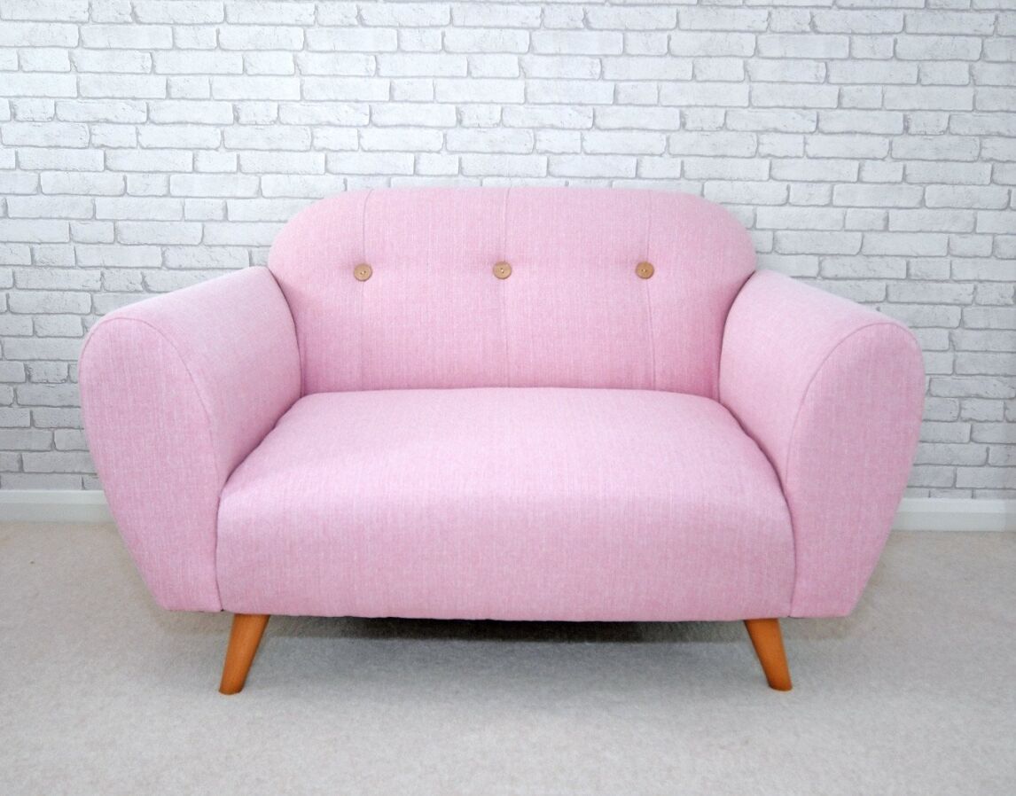 pink sofa: DFS Betsey pink cuddler sofa
