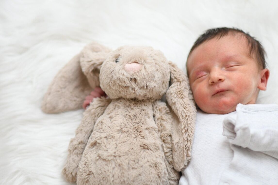 one week old newborn baby boy