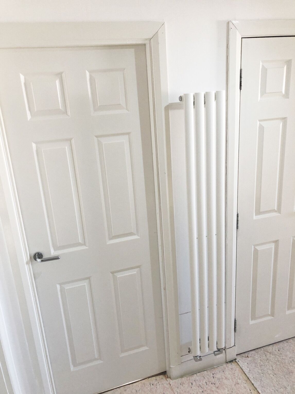 vertical radiator in narrow hall