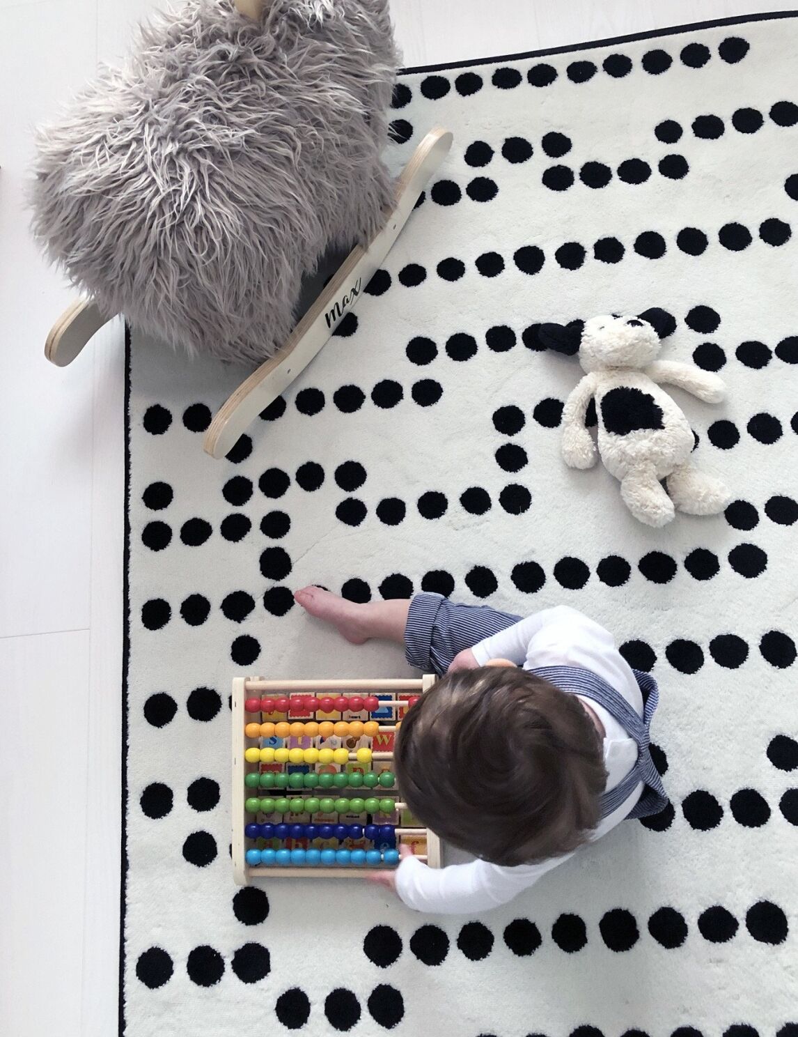 toddler playing on the floor