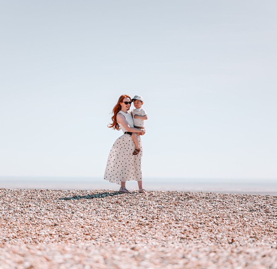 Amber and Max on the shingle beack at Dungeness