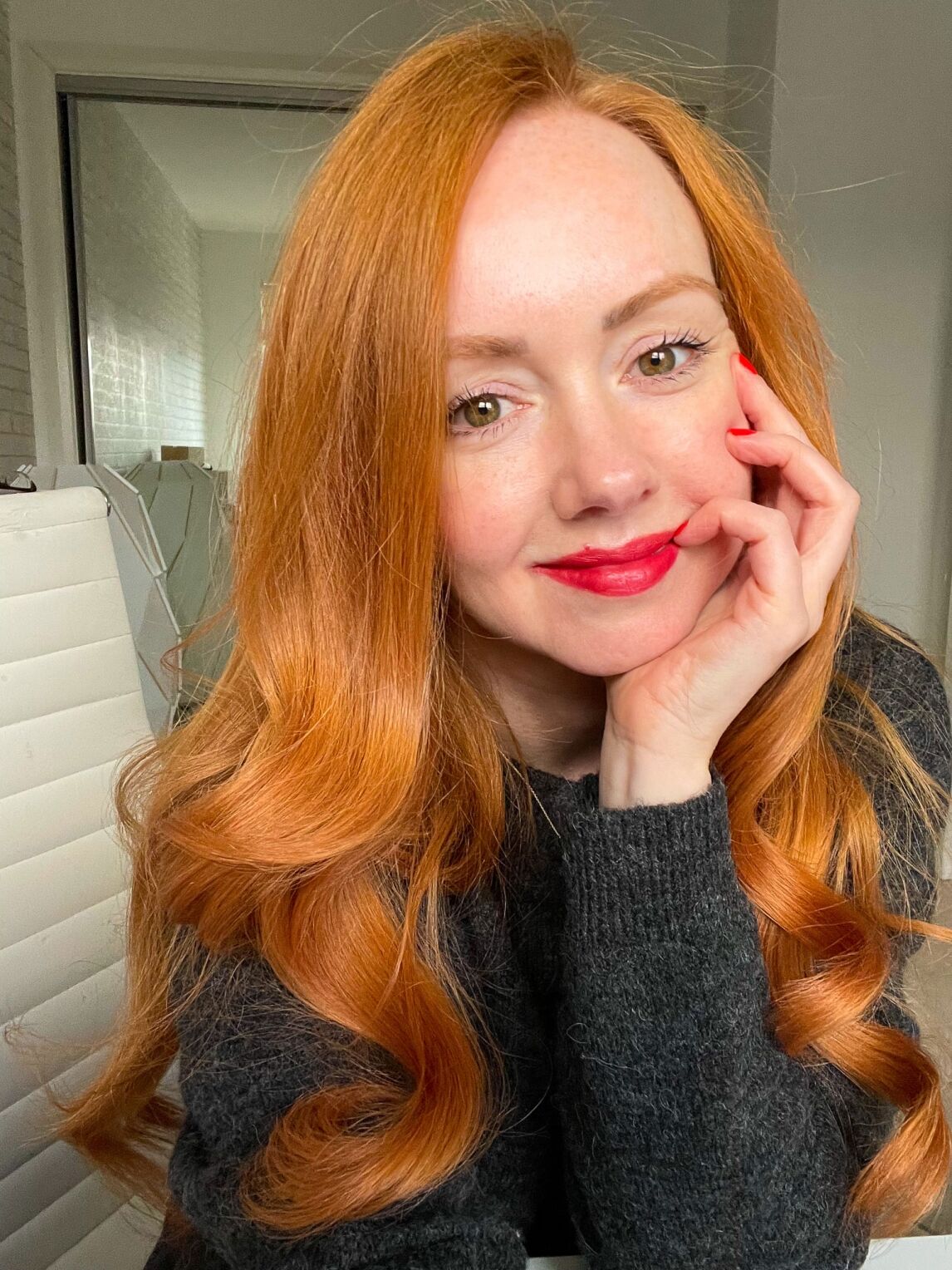 my face after using the Foreo Bear facial toning device